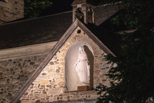 architectural detail of the Sainte Marie chapel at night in Saint Lary Soulan in France