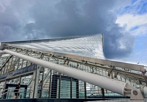 KAOHSIUNG, TAIWAN -- JUNE 26, 2014: The entrance to the Formosa Boulevard Station of the Kaohsiung City subway transportation system sports a modern design with curved lines.