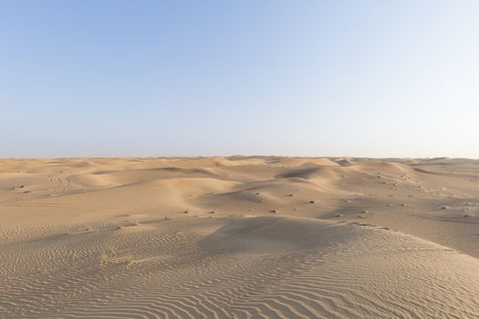 Desert lansdcape with yellow, red sand dunes