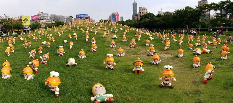 KAOHSIUNG, TAIWAN -- JUNE 28, 2014: These cute fruit wizards have been set up in a public park by the agricultural bureau to promote the sale of local farm products.