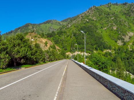 Asphalt road to Shymbulak ski resort near Almaty, Kazakhstan