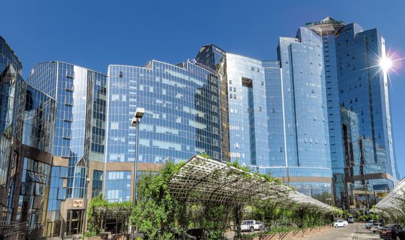 ALMATY, KAZAKHSTAN - MAY 14, 2017: Panoramic view of Business Center Nurly Tau. Made in the style of Hi-Tech, repeating silhouettes of mountains Zailisky Alatau. Construction company - Basis A.

Almaty, Kazakhstan - May 14, 2017: Panoramic view of Business Center Nurly Tau in Almaty, Kazakhstan. Made in the style of Hi-Tech, repeating silhouettes of mountains Zailisky Alatau. Construction company - Basis A.
