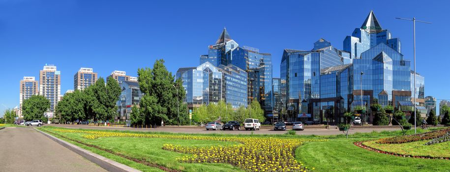 ALMATY, KAZAKHSTAN - MAY 14, 2017: Panoramic view of Business Center Nurly Tau. Made in the style of Hi-Tech, repeating silhouettes of mountains Zailisky Alatau. Construction company - Basis A.

Almaty, Kazakhstan - May 14, 2017: Panoramic view of Business Center Nurly Tau in Almaty, Kazakhstan. Made in the style of Hi-Tech, repeating silhouettes of mountains Zailisky Alatau. Construction company - Basis A.