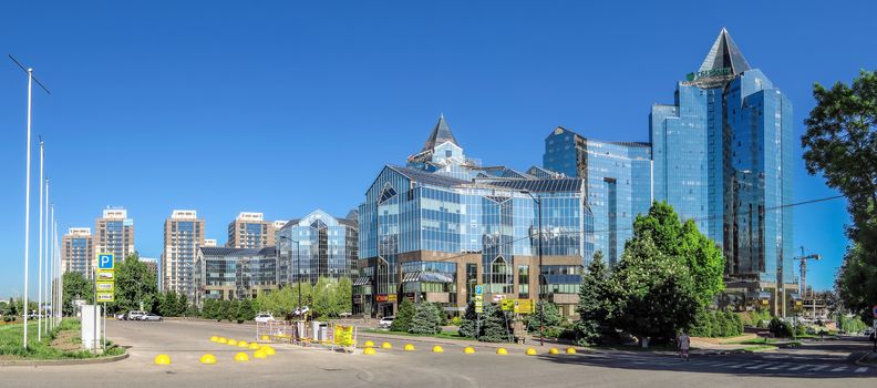 ALMATY, KAZAKHSTAN - MAY 14, 2017: Panoramic view of Business Center Nurly Tau. Made in the style of Hi-Tech, repeating silhouettes of mountains Zailisky Alatau. Construction company - Basis A.

Almaty, Kazakhstan - May 14, 2017: Panoramic view of Business Center Nurly Tau in Almaty, Kazakhstan. Made in the style of Hi-Tech, repeating silhouettes of mountains Zailisky Alatau. Construction company - Basis A.