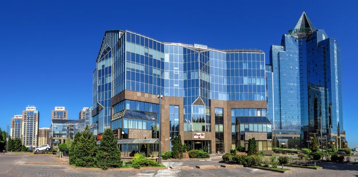 ALMATY, KAZAKHSTAN - MAY 14, 2017: Panoramic view of Business Center Nurly Tau. Made in the style of Hi-Tech, repeating silhouettes of mountains Zailisky Alatau. Construction company - Basis A.

Almaty, Kazakhstan - May 14, 2017: Panoramic view of Business Center Nurly Tau in Almaty, Kazakhstan. Made in the style of Hi-Tech, repeating silhouettes of mountains Zailisky Alatau. Construction company - Basis A.