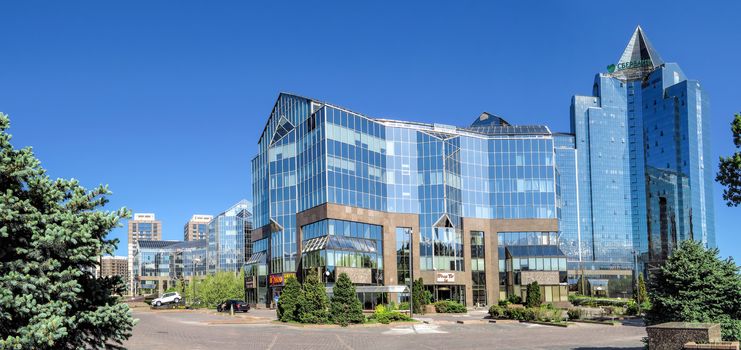 ALMATY, KAZAKHSTAN - MAY 14, 2017: Panoramic view of Business Center Nurly Tau. Made in the style of Hi-Tech, repeating silhouettes of mountains Zailisky Alatau. Construction company - Basis A.

Almaty, Kazakhstan - May 14, 2017: Panoramic view of Business Center Nurly Tau in Almaty, Kazakhstan. Made in the style of Hi-Tech, repeating silhouettes of mountains Zailisky Alatau. Construction company - Basis A.