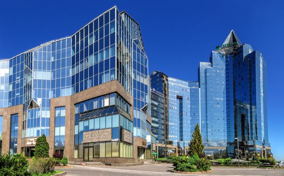 ALMATY, KAZAKHSTAN - MAY 14, 2017: Panoramic view of Business Center Nurly Tau. Made in the style of Hi-Tech, repeating silhouettes of mountains Zailisky Alatau. Construction company - Basis A.

Almaty, Kazakhstan - May 14, 2017: Panoramic view of Business Center Nurly Tau in Almaty, Kazakhstan. Made in the style of Hi-Tech, repeating silhouettes of mountains Zailisky Alatau. Construction company - Basis A.