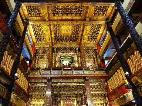 PINGTUNG, TAIWAN -- JULY 6 , 2017: The richly decorated interior of the Fu-An Temple, the largest temple dedicated to the Earth God in Taiwan.