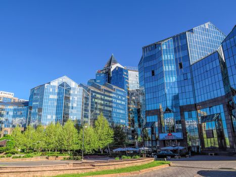 ALMATY, KAZAKHSTAN - MAY 14, 2017: Business Center Nurly Tau in Almaty, Kazakhstan. Made in the style of Hi-Tech, repeating silhouettes of mountains Zailisky Alatau. Construction company - Basis A.

Almaty, Kazakhstan - May 14, 2017: Business Center Nurly Tau in Almaty, Kazakhstan. Made in the style of Hi-Tech, repeating silhouettes of mountains Zailisky Alatau. Construction company - Basis A.