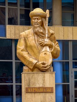 ALMATY, KAZAKHSTAN - MARCH 26, 2017: Bust of Kurmangazy opposite the Kazakh National Conservatory in Almaty, Kazakhstan. Was a Kazkh composer, instrumentalist, and folk artist.

Almaty, Kazakhstan - March 26, 2017: Kazakh National Conservatory named after Kurmangazy in Almaty, Kazakhstan. Was a Kazkh composer, instrumentalist, and folk artist.