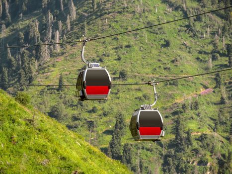 Two cabins of the funicular over the mountains of the Trans-Ili Alatau