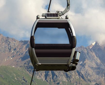 Cabin of the funicular over the mountains of the Trans-Ili Alatau
