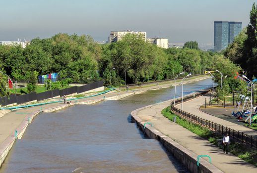 ALMATY, KAZAKHSTAN - MAY 12, 2017: Esentai river in the city centre of Almaty, Kazakhstan

Almaty, Kazakhstan - May 12, 2017: Esentai river in the city centre of Almaty, Kazakhstan
