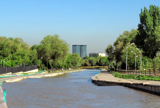 ALMATY, KAZAKHSTAN - MAY 12, 2017: Esentai river in the city centre of Almaty, Kazakhstan

Almaty, Kazakhstan - May 12, 2017: Esentai river in the city centre of Almaty, Kazakhstan