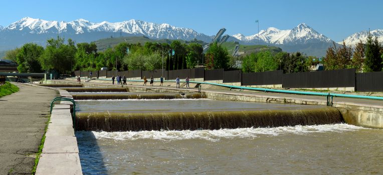 ALMATY, KAZAKHSTAN - MAY 12, 2017: Esentai river in the city centre of Almaty, Kazakhstan

Almaty, Kazakhstan - May 12, 2017: Esentai river in the city centre of Almaty, Kazakhstan