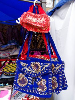Traditional souvenirs - Kazakh ethnic handbags in street market in Almaty, Kazakhstan
