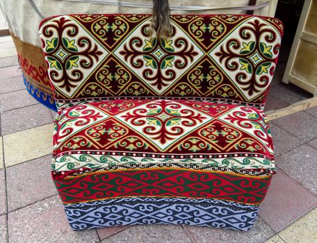 Kazakh ethnic sofa near yurt in Almaty, Kazakhstan
