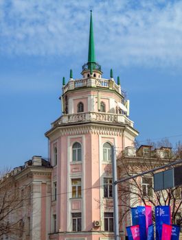 ALMATY, KAZAKHSTAN - MARCH 21, 2017: Old building with spire in Almaty, Kazakhstan.

Almaty, Kazakhstan - March 21, 2017: Old building with spire in Almaty, Kazakhstan.