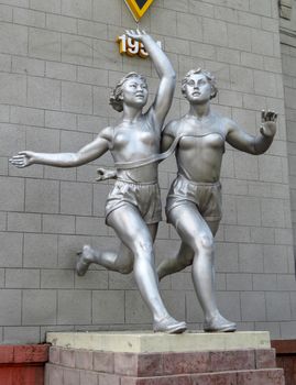 ALMATY, KAZAKHSTAN - MAY 21, 2017: Old sculpture of women runners located near The Central Stadium of Almaty city, Kazakhstan.

Almaty, Kazakhstan - May 21, 2017: Old sculpture of women runners located near The Central Stadium of Almaty city, Kazakhstan.