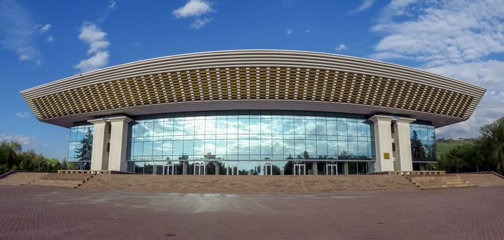 ALMATY, KAZAKHSTAN - MAY 7, 2017: Modern architecture in the historic centre of Almaty.

Almaty, Kazakhstan - May 7, 2017: Modern architecture in the historic centre of Almaty.