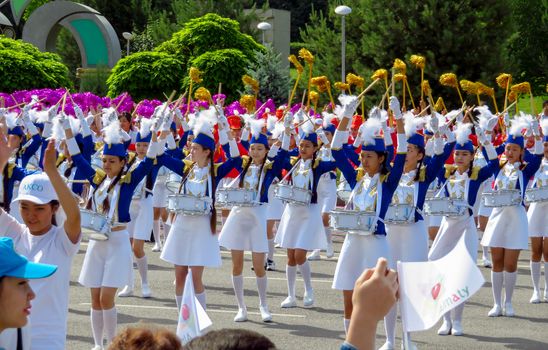 ALMATY, KAZAKHSTAN - JUNE 1, 2017: Solemn parade of children's and youth musical orchestras and ensembles on the Republic Square. More than 5,000 schoolchildren took part in the parade.

Almaty, Kazakhstan - June 1, 2017: Solemn parade of children's and youth musical orchestras and ensembles on the Republic Square. More than 5,000 schoolchildren of the megapolis took part in the parade.