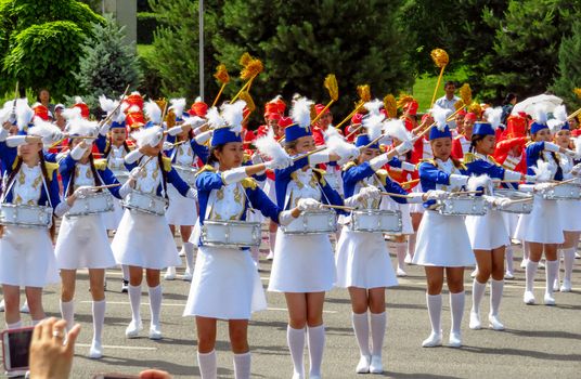 ALMATY, KAZAKHSTAN - JUNE 1, 2017: Solemn parade of children's and youth musical orchestras and ensembles on the Republic Square. More than 5,000 schoolchildren took part in the parade.

Almaty, Kazakhstan - June 1, 2017: Solemn parade of children's and youth musical orchestras and ensembles on the Republic Square. More than 5,000 schoolchildren of the megapolis took part in the parade.