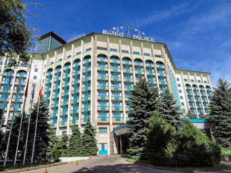 ALMATY, KAZAKHSTAN - MAY 21, 2017: The Rahat Palace Hotel is located at the intersection of Satpayev and Baizakov streets in Almaty, Kazakhstan

Almaty, Kazakhstan - May 21, 2017: The Rahat Palace Hotel is located at the intersection of Satpayev and Baizakov streets in Almaty, Kazakhstan