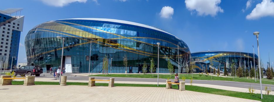 ALMATY, KAZAKHSTAN - APRIL 23, 2017: Ice complex - Almaty Arena, was built in 2016 for Winter Universiade in Almaty city.

Almaty, Kazakhstan - April 23, 2017: Ice complex - Almaty Arena, was built in 2016 for Winter Universiade in Almaty city.