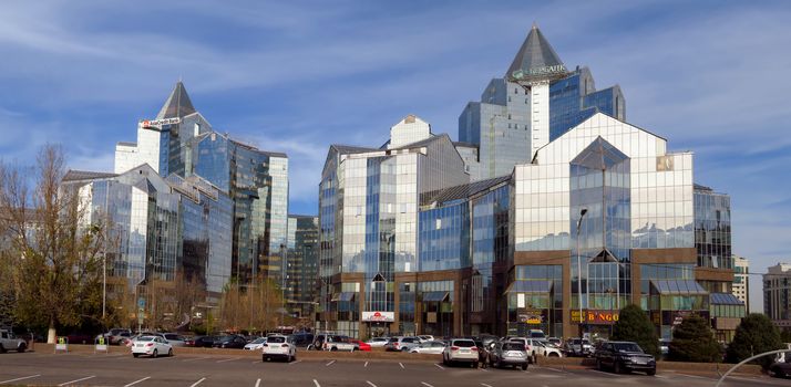 Almaty, Kazakhstan - November 9, 2017: Business Center Nurly Tau in Almaty, Kazakhstan. Made in the style of Hi-Tech, repeating silhouettes of mountains Zailisky Alatau.
