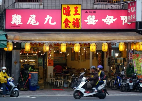 KAOHSIUNG, TAIWAN -- MARCH 8, 2014: A Chinese restaurant that serves traditional duck hot pot cooked with ginger, a popular winter food in Taiwan.