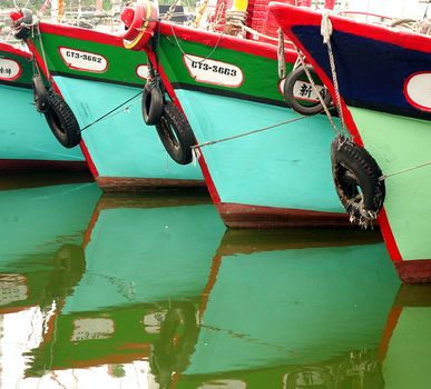 LINYUAN, TAIWAN -- MAY 28, 2017: Fishing vessels are anchored in the Zhongyun Fishing Port in southern Taiwan.