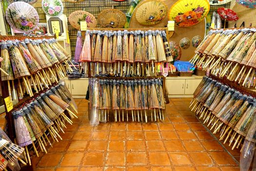 KAOHSIUNG, TAIWAN -- JULY 24, 2016: A shop sells hand-painted oil-paper umbrellas, which are traditional art and craft products by the Chinese Hakka people.