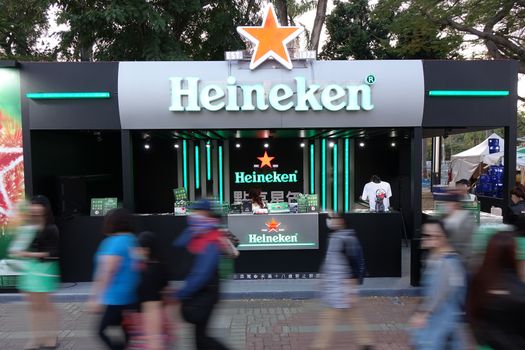 KAOHSIUNG, TAIWAN -- FEBRUARY 19, 2018: A outdoor stall by Heineken beer brewery sells alcoholic beverages during an outdoor event.