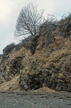 Image of a section of the cliffs/ rocks at Carylon Bay on the Coast of Cornwall, UK.