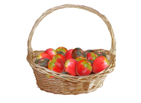 Basket with tomatoes isolated on white background