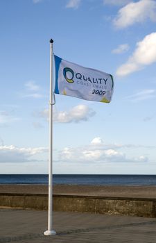 A flag flying for the quality coast awards