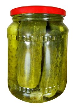 Pickled cucumbers in a glass jar isolated on white background. Clipping path included
