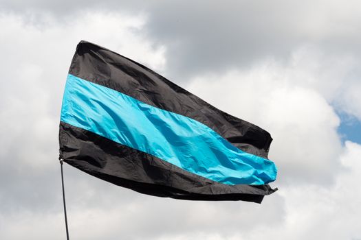 PARKER"S PIECE, CAMBRIDGE - JULY 7: flag of Team Sky cycling team taken at Tour de France Stage 3 Cambridge to London on July 7, 2014 at Parker's Piece, Cambridge, Cambridgeshire, UK.