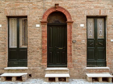 Doors of old building in Rimini, Italy
