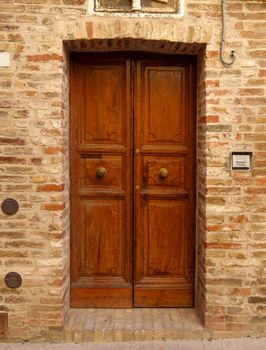 Door of old building in Rimini, Italy