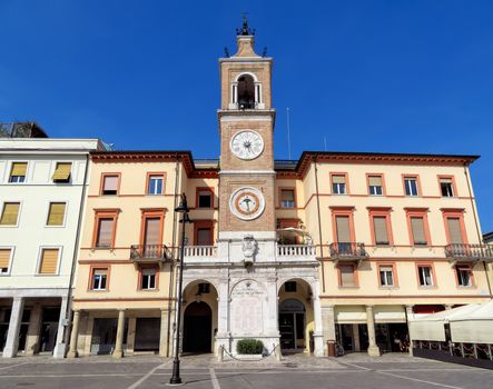 The square Piazza tre Martiri with the ancient clock tower