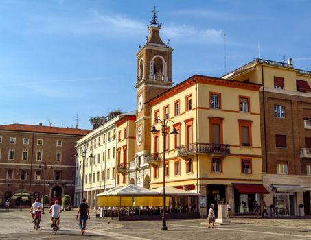 Rimini, Italy - June 21, 2017: The square Piazza tre Martiri with the ancient clock tower