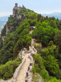 San Marino, San Marino Republic - June 16, 2017: Castle of San Marino on the rock with footpath