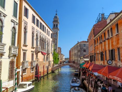 Venice, Italy - June 20, 2017: Falling campanile over a Venetian Canal in Venice, Italy
