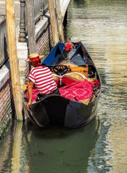 Unrecognized gondolier in gondola in Venice, Italy.