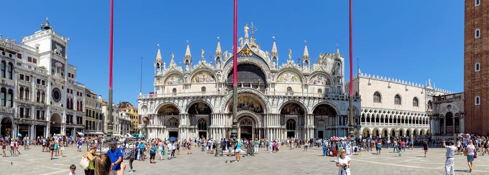 Venice, Italy - June 20, 2017: Panoramic view of a San Marco square in Venice, Italy. Thousands of tourists every month visit St Mark's Square.