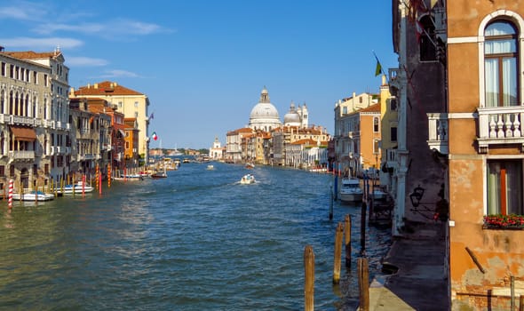 Venice, Italy - June 20, 2017: View to cathedral of Santa Maria della Salute from Grand Canal in Venice, Italy.