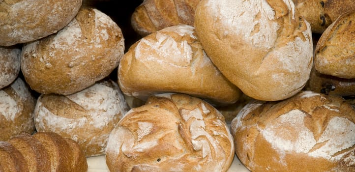 A pile of bread loaves for sale