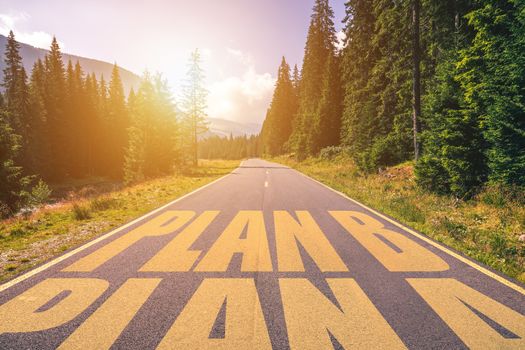 Empty asphalt road with Plan A and Plan B concept. Driving on an empty road in the mountains to the Plan B and leaving behind the Plan A. 