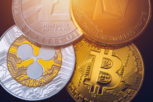 Set of cryptocurrencies with Bitcoin, Etherium, Ripple, Litecoin. Cryptocurrencys new digital money. Bitcoin on the front as the leader. Bitcoin as most important cryptocurrency.